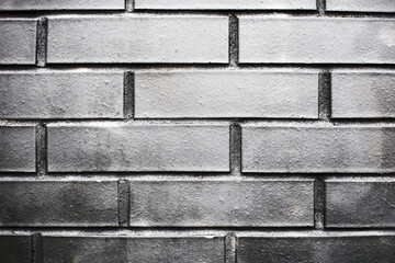 Black brick pattern. Grunge brick wall texture. Dark blocks background. Antique urban design.