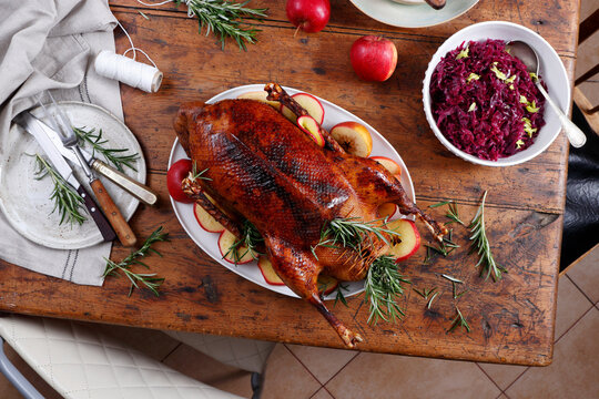 Roasted goose with apples and red cabbage