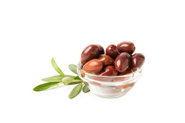 Delicious red olives isolated on white background. Marinated olives in a bowl. Delicious olives. Close-up. Vegan.