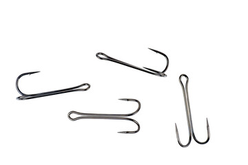 Hooks for professional spinning fishers isolated on white.