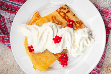 crepes whipped cream pancakes portion sweet delicious dessert appetizer meal food snack on the table copy space