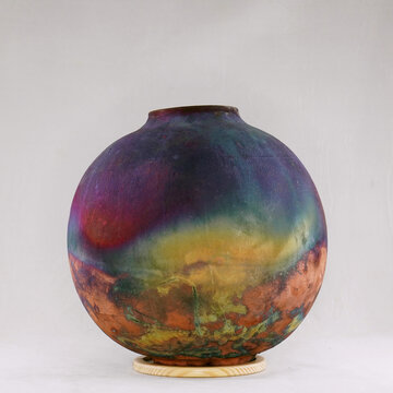 RAAQUU Raku ceramic pottery Vase rainbow aurora textured pattern home d&eacute;cor piece by Adil Ghani from Malaysia