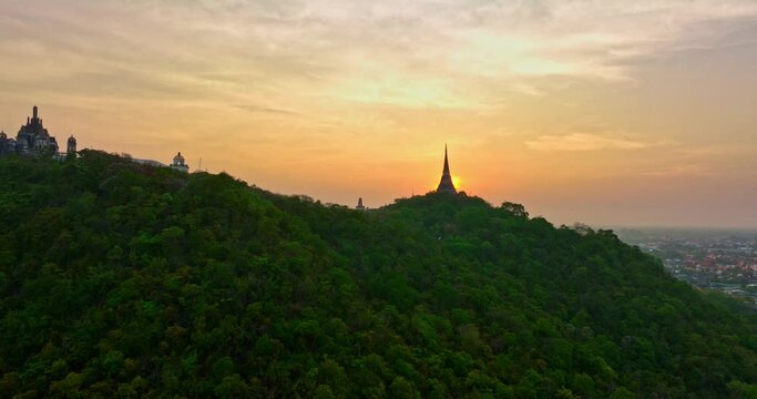 aerial view The rays of the sun shine on the top of the castle..The rays of the yellow sun pierced through the palace..Bright sky in the morning sun above the hilltop palace..