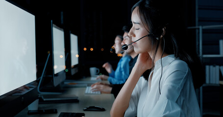 Call center employees are tired from working in groups at night. Service available 24 hours a day.