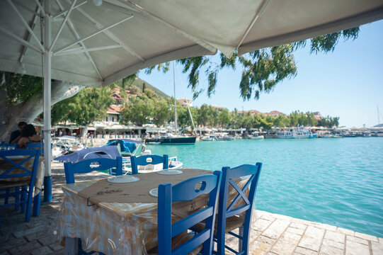 A cute restaurant table by the sea in Greece