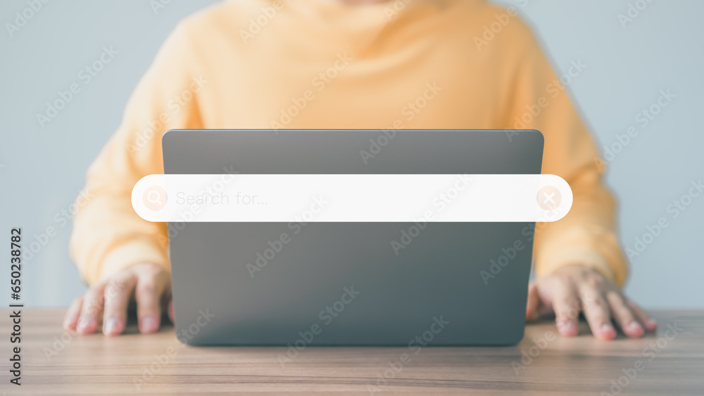 Poster User working with a laptop computer on table in office. Search engine optimization the internet with search bar. Best SEO technology networking, Searching browsing internet data information concept.