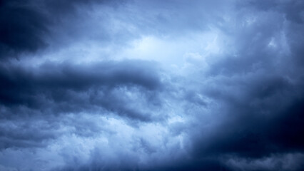 Dramatic sky background. Stormy clouds in the dark sky. Panoramic image can be used as a web banner or wide site header.