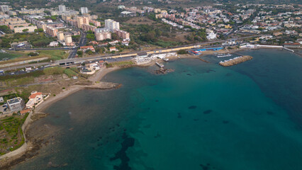 Aerial panorama of Civitavecchia. Photo of the town with crystal clear sea and warm light.
