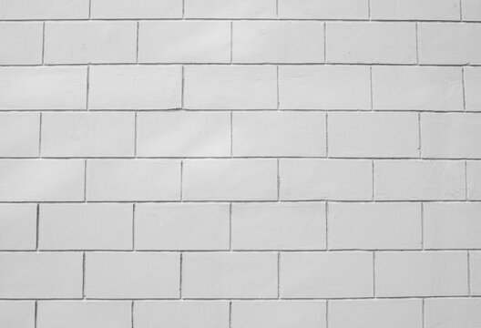 Gray wall made of block, brick. Concrete blocks, surface.