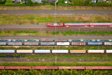 Aerial view of railway station in Marl-Sinsen, Germany. Passing local train and several parallel...