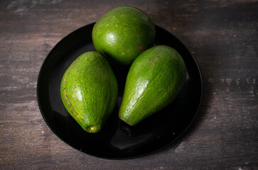 avocado on a black background