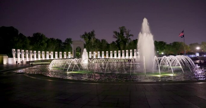 National World War II Memorial sculptures and fountains at night in Washington DC