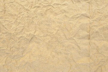 Crumpled paper beige texture background