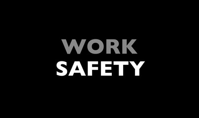 Work safety written on black background 