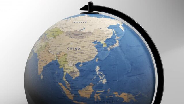 Atlas map of the world globe spinning zooming in and focusing on the country of Asia, Asian. Showing area, motion video stock in HD and 4K 