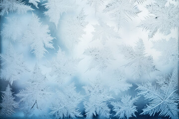 Elaborate frost patterns on winter windowpanes background with empty space for text 