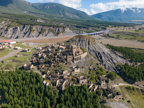 Aerial drone photo of the abandoned village named Esco at lake Aragon in Spain