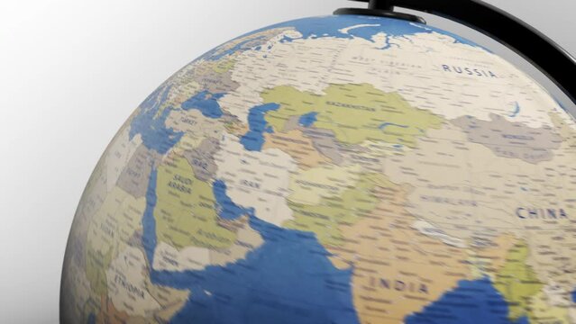 Atlas map of the world globe spinning zooming in and focusing on the country of Europe, EU, Euro, European. Showing area, motion video stock in HD and 4K 