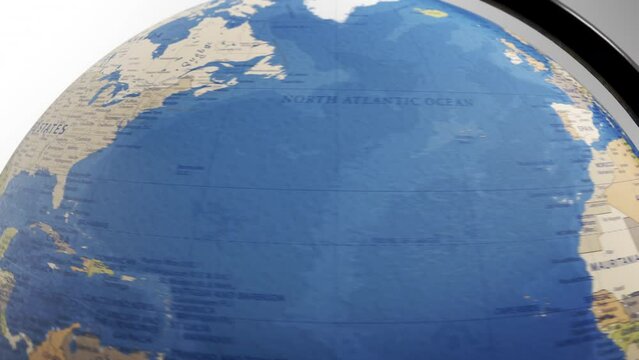 Atlas map of the world globe spinning zooming in and focusing on the country of USA, America, American, states, US, Canada. Showing area, motion video stock in HD and 4K 