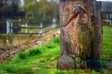 wooden carving on a bench
