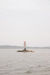 Tokarevsky lighthouse on the shore in the city of Vladivostok.