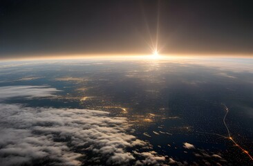 宇宙から見た地球：日の出と都市の明かり、宇宙空間、雲、海洋、大陸が見える