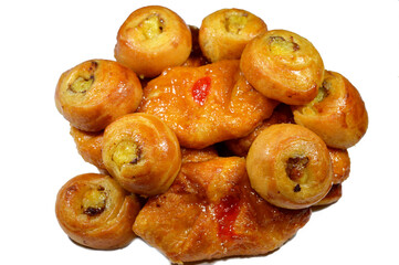 Background of Mini baked Danish pastry stuffed and topped with honey sugary sweet syrup and cherry...