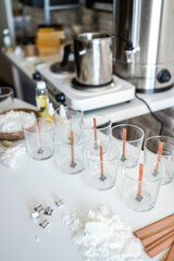 Tools for making candles in a workshop