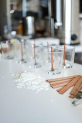 Tools for making candles in a workshop