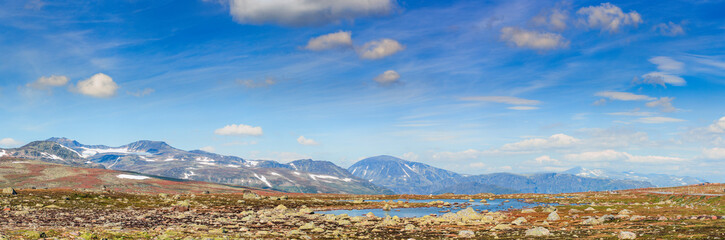 Mountain panorama with lake in Jotunheimen national park in Norway, Europe - obrazy, fototapety, plakaty