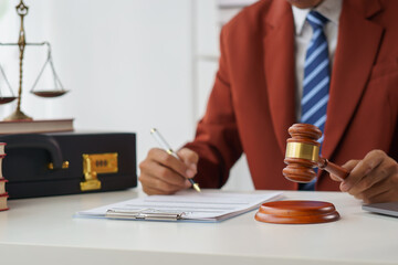 A lawyer or notary reads the statute of limitations. Providing advice between male lawyers Revenue Office Law office, judge, legal advisor Lawyers working in the office