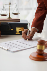 A lawyer or notary reads the statute of limitations. Providing advice between male lawyers Revenue Office Law office, judge, legal advisor Lawyers working in the office - obrazy, fototapety, plakaty