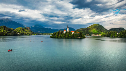 Fototapeta na wymiar Bled with lake, island and mountains in background, Slovenia, Europe