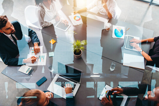 Business people in office work together during a meeting