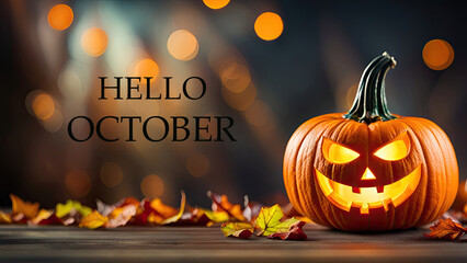 Hello October greeting with bright orange pumpkin and maple leaves on a blurred autumn forest bokeh background.Fall season,Halloween concept.