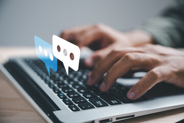 A businessmans laptop serves as the gateway to her social media and online marketing strategy. This...