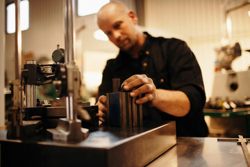 Middle aged man working in a factory