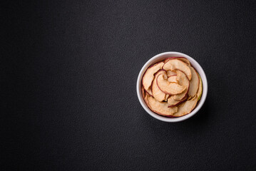 Delicious ripe red apple, sliced and dried in a special dryer