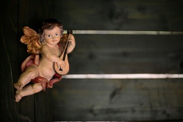 wood figure of an Raphael angel putti
