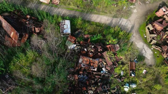 Drone footage of Rusted vehicles in Rozsokha Vehicle settler, chernobyl Exclusion Zone of Ukraine. 
