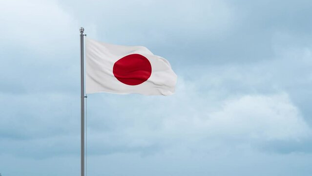 Japan flag waving in the wind, cloudy blue sky with running clouds, endless seamless loop