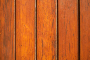 Brown wood texture background coming from natural tree. The wooden panel has a beautiful dark pattern, hardwood floor texture