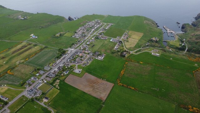 View of stunning green landscape of Lybster, Scotland