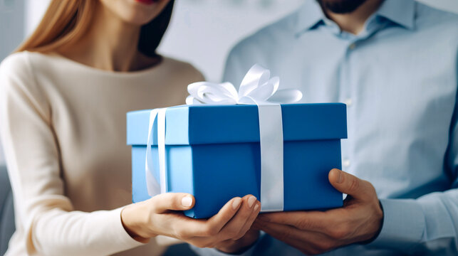 Generative AI image of crop anonymous couple holding small gift box wrapped with white ribbon against blurred background