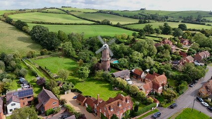 Aerial view of the Quainton Windmill and nearby rural areas in the United Kingdom