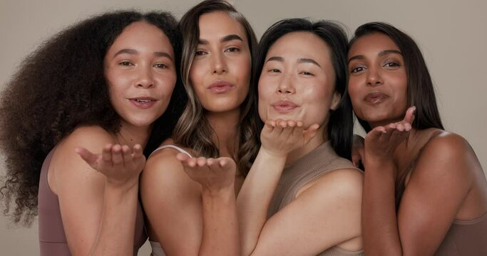 Skincare, group and happy women blow kiss for studio cosmetics, self care affection or spa wellness. Beauty, intimate love gesture and diversity portrait of friends together on studio background