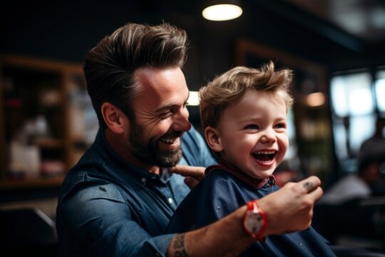 Father and son in barbershop, happy smiling.