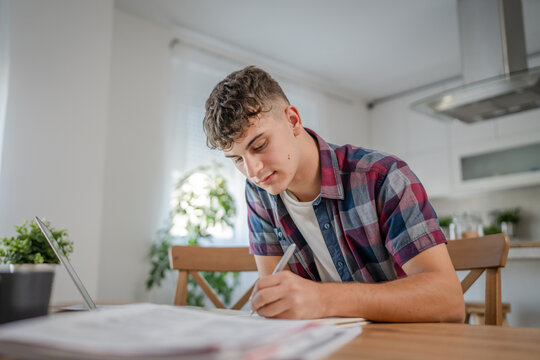 Young Caucasian Man Teenager Student Study At Home