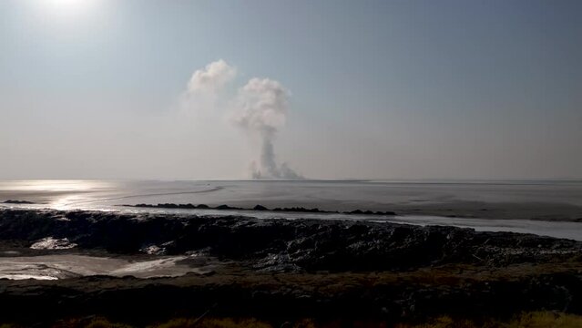 Hot mudflow in Porong Sidoarjo, East Java, Indonesia. As a result of oil drilling, a mudflow began on May 29, 2006.