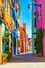 Fototapeta na wymiar Very Colorful Row Houses in Venice Italy 